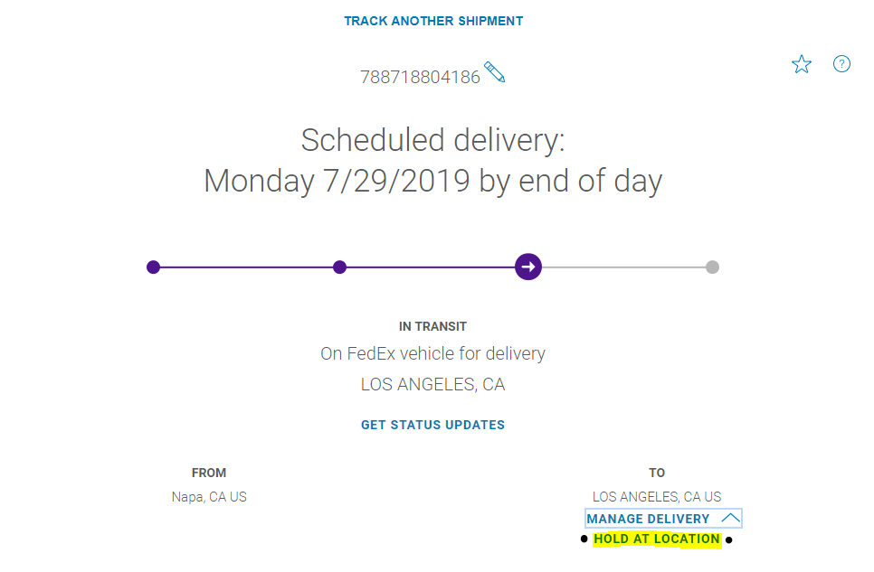 How do I request to hold a wine order at a FedEx location?